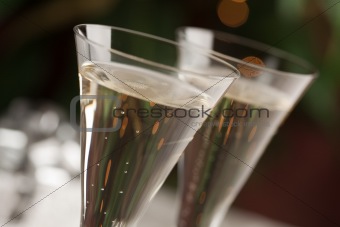 Champagne Glasses Abstract with Sparkling Lights in the Background.