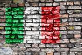Flag of Italy painted on an old brick wall
