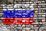Flag of Russia painted on an old brick wall