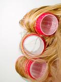 Red Curlers in Blond Hair