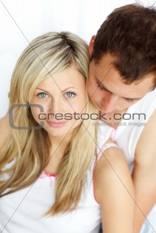 Cheerful woman sitting with her boyfriend
