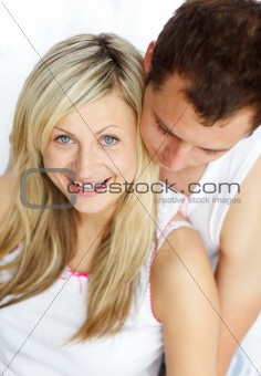Smiling woman sitting with her boyfriend