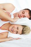 Woman trying to sleep with man snoring