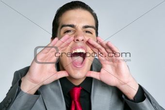 Businessman open hands shout to camera