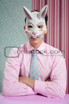 Businessman with funny rabbit mask