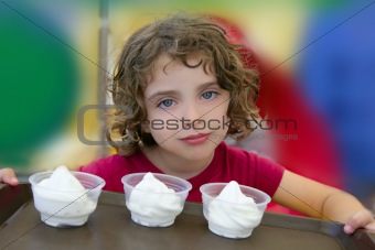 Adorable little girl holding three ice cream