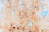 Weathered surface of a steel sheet with paint scraps