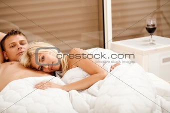 Mid adult couple in bedroom