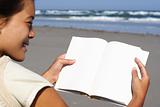 woman reading blank book