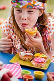 Happy eating cupcake girl