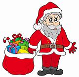 Happy Santa Claus with gifts