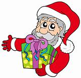 Santa Claus holding gift