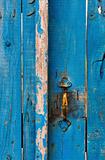 Highly textured blue wooden gate