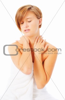Woman in Towel Massaing Herself