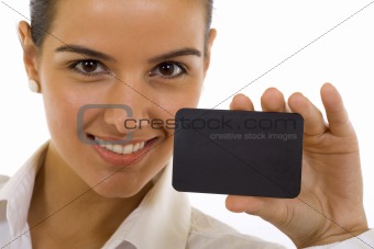 woman with big smile displaying blank business card