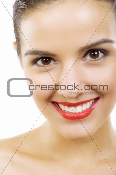 studio shot of a smiling woman
