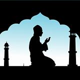 silhouette of human offering prayers at mosque