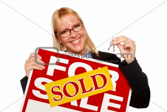 Attractive Blonde Holding Keys & Sold For Sale Sign Isolated on a White Background.