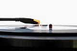 close up of an old vinyl record player on white background