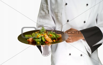 Chef holding salad