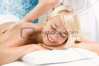 Beautiful young woman getting a spa treatment