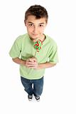 Boy holding a lollipop