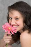 Portrait of the beautiful girl with flower chrysanthemum