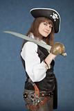 Sea pirate of a female with sabre on blue background