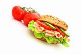 Fresh sandwich with ham and cheese and vegetables