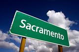 Sacramento Road Sign with dramatic blue sky and clouds - U.S. State Capitals Series.