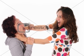 Two young woman fighting 