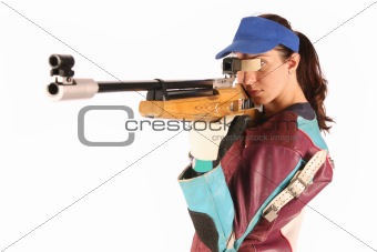 woman aiming a pneumatic air rifle