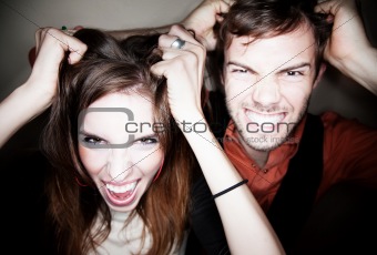Couple tearing out their hair