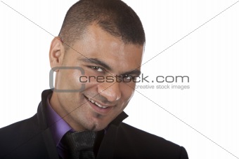 Young Business man smiles in camera