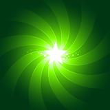 Vibrant green light burst background with shiningcenter star