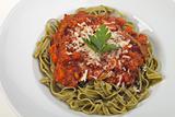 tagliatelle with sauce bolognaise in white plates
