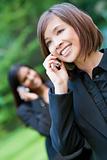 Beautiful Chinese Asian Oriental Woman Talking On Her Cell Phone