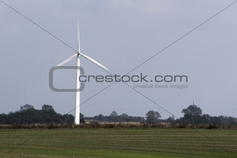 Windmill on field