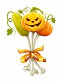 funny bouquet made of halloween pumpkins on bones