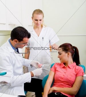 dentist demonstrate tooth brush
