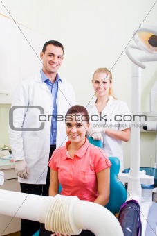 dentist and assist with patient in office