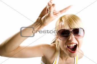 Young woman making a rock sign