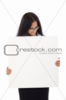 businesswoman holding a blank board