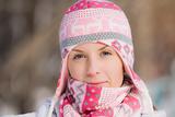 Pretty girl wearing warm hat and scarf