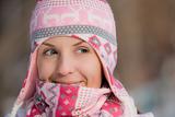 Pretty girl wearing warm hat and scarf