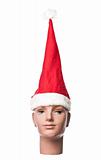 Santa claus hat on a doll