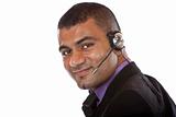 Young male call center agent with headset 