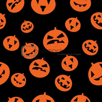 Seamless pattern with orange pumpkins on black background