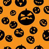 Seamless pattern with black pumpkins on orange background