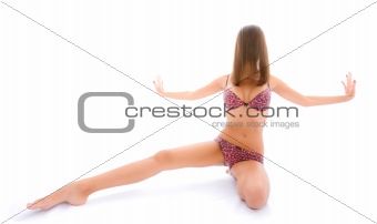 Young woman poses over white